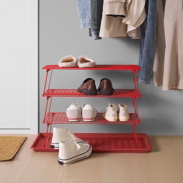 A bright red GREJIG shoe rack