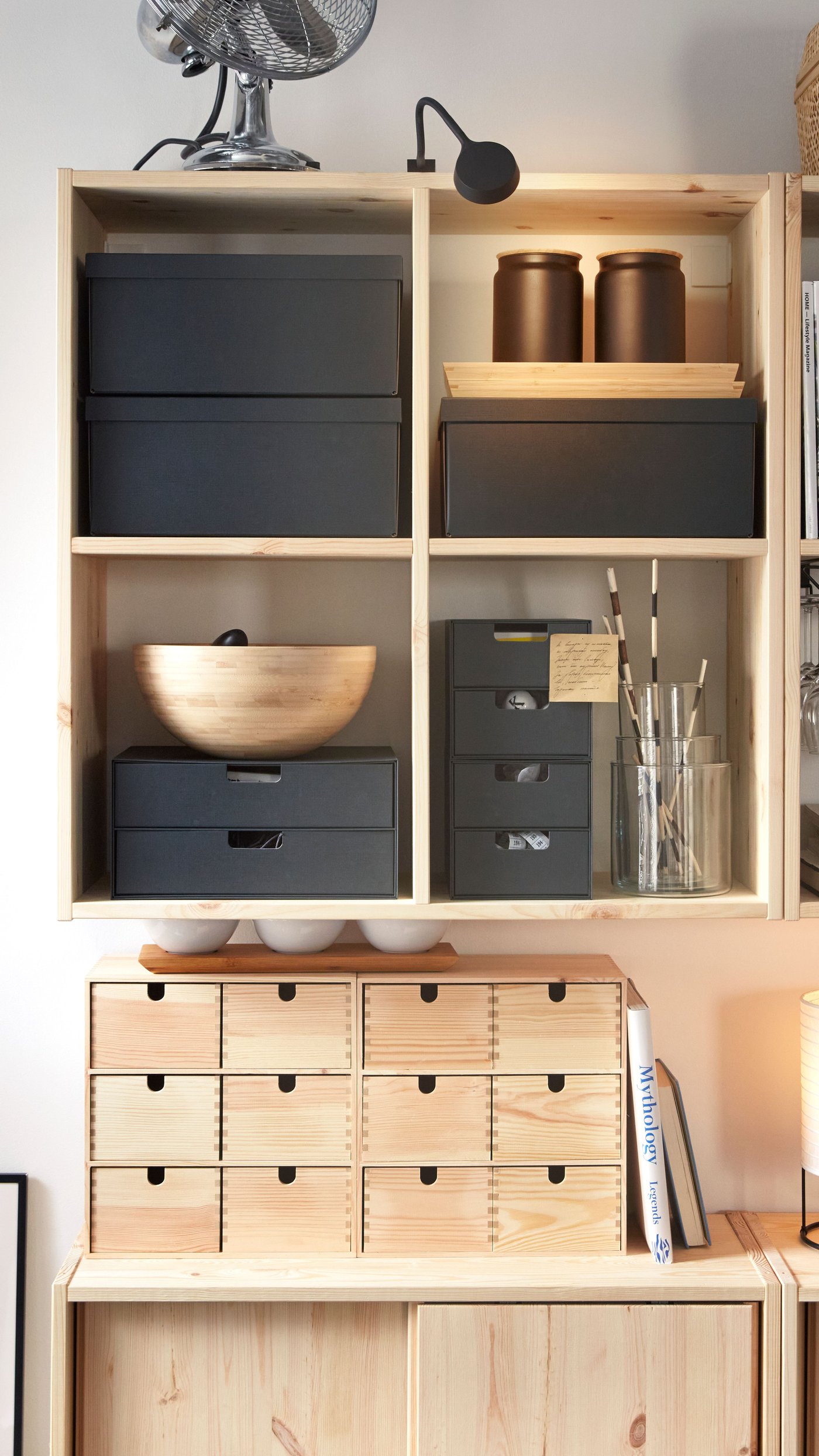 A pine IVAR shelv unit w sliding doors in the living room